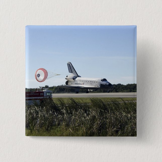 Rymdskytteln Atlantis upprullar sin dragkedja Knapp (Framsida)