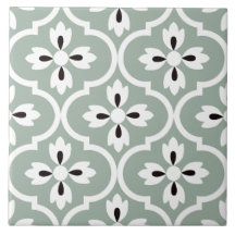 Sage grönt, vit blommigt, svarta vattendroppar