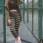 Sage Grönt Zebra tryck Leggings<br><div class="desc">Dessa balar från zebra tryck är designade med en fängslande twist, som innehåller Sage Grönt-färgad zebra ränder som ger den klassiska zebra mönstrad en djärv och livfull beröring. Den unika kombinationen av traditionell zebra mönstrad med den slående Sage Grönt hue skapar ett slående och öga-fångstande utseende som säkert kommer att...</div>