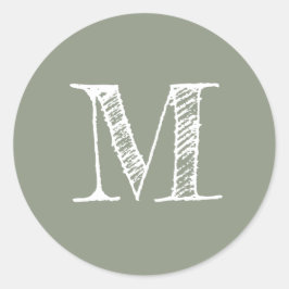 Sagegrön monograminitial runt klistermärke