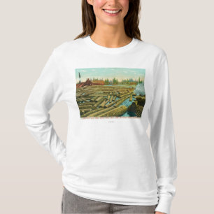 Sågverk och fördämningen, floden fyllde med tee shirt