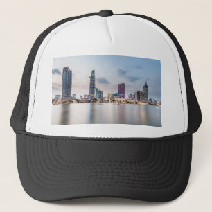 Saigon (Ho Chi Minh City) skylin vid solnedgång Keps