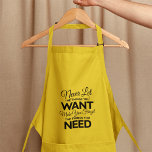 Sak som ska skrivas ut som standard-Apron Förkläde<br><div class="desc">Låt aldrig Saken du vill få dig att glömma Saken du behöver.</div>