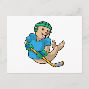 Säl vid ishockey med ishockeyklubba vykort