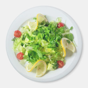 Sallad med citroner och tomatkylskåpmagneten magnet