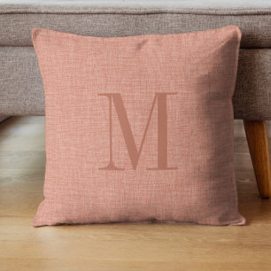 Salmon red linen struktur monogram kudde
