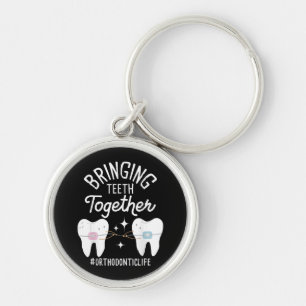 Sammanfogning av Teeth - Orthodontist Rund Silverfärgad Nyckelring