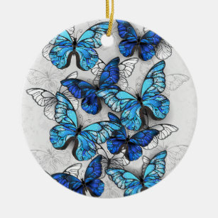 Sammansättning av vita och blå fjärilar julgransprydnad keramik