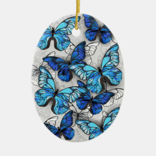 Sammansättning av vita och blå fjärilar julgransprydnad keramik