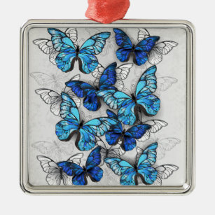 Sammansättning av vita och blå fjärilar julgransprydnad metall