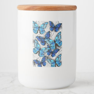 Sammansättning av vita och blå fjärilar mat etikett