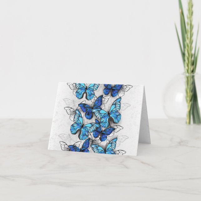 Sammansättning av vita och blå fjärilar tack kort (Framsida)