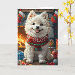 Samojedhund med julklappar öppen spis kort