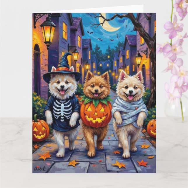 Samoyed-hundar som går runt och bugar på Halloween Kort (Orkide)