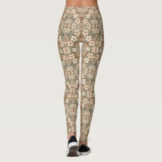 Samtida folkkonstblommor i mjuka jordnära toner leggings