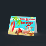 San Diego julen tomte och surfbräda strand Helgkort<br><div class="desc">Den här glada julen semesterkort har Tomten på en strand i San Diego. Han kopplar av med sina surfbrädor,  njuter av solen,  palmer och sin pipa.  Greeting inuti ~ "Varmaste önskningar från vår semesterparadis till din... ". All text på detta kort kan anpassas för att läsas som du önskar.</div>