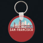 San Francisco Retro City Skyline Vintage Cityscape Nyckelring<br><div class="desc">Vintage- och reflexritorier med vackra skyliner, attraktion och cityscape-konst. Coola skyscraper och byggnad silhuette illustrerar handelsvara för turister och resenärer. Perfekt som souvenir att ta med sig hem när man reser värld runt. Spara minnet av din resa och semester med familj och vänner. Bakgrunden till färg kan anpassas till färg....</div>
