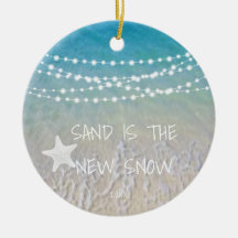 Sand är den nya julprydnaden i Snö