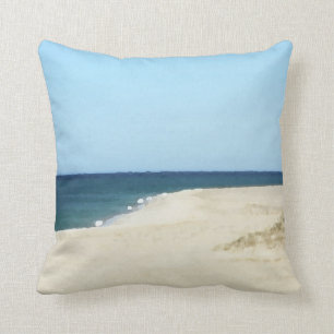 Sand, hav och himmel på uddtorsk kudde