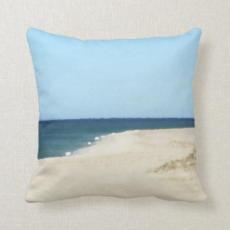 Sand, hav och himmel på uddtorsk kudde