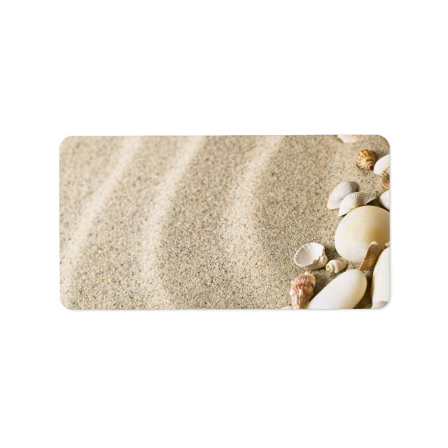 Sand med Snäckor och stenar. Sammansättning av seg Adressetikett (Framsidan)