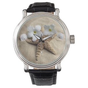 Sand platssjöstjärnan och sanddollar på armbandsur