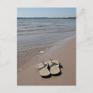 Sandaler på stranden vykort