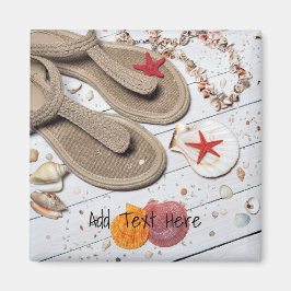 Sandaler, sjöar och stjärtar vid stranden magnet