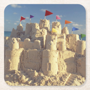Sandcastle på strand underlägg papper kvadrat