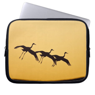 Sandhill Crane landing at sunset Laptop Fodral