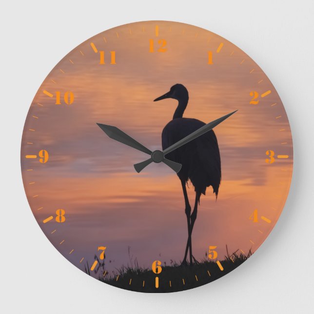 Sandhill crane (silhuette) vid solnedgång stor klocka (Framsida)