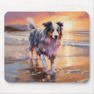 Sandig australisk herdehund på strand vid solnedgå musmatta