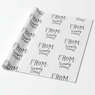 Sandiga klor som slår in papper presentpapper