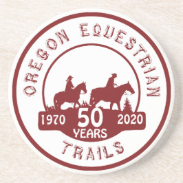 Sandstenkustfartyg med logotypen underlägg