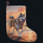 Sandy Tassar Alaska Malamute Hund on Beach Sunset Liten Julstrumpa<br><div class="desc">Ta dig in i vår vackra "Sandy Tassar och Sunset Hues"-hund på solnedgången. Den här fängslande scenen fångar kärnan av en perfekt kväll vid kusten, med en lojal hund-vän som njuter av den gyllene sanden och de andningsande nyheterna om sol. Oavsett om du är hund älskare eller solnedgångsentusiaster, så ger...</div>