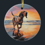 Sandy Tassar Bloodhound Hund on Beach Sunset Julgransprydnad Keramik<br><div class="desc">Ta dig in i vår vackra "Sandy Tassar och Sunset Hues"-hund på solnedgången. Den här fängslande scenen fångar kärnan av en perfekt kväll vid kusten, med en lojal hund-vän som njuter av den gyllene sanden och de andningsande nyheterna om sol. Oavsett om du är hund älskare eller solnedgångsentusiaster, så ger...</div>