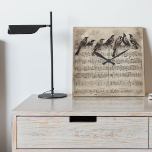 sång fåglar sitta om musikaliska kompositioner fyrkantig klocka