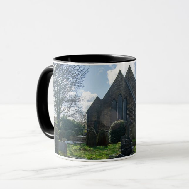 Sankta Lukas kyrka och kyrkogård, Norland Mugg (Framsida vänster)