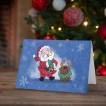 Santa Chocolate Lab Reindeer Joy Ldotterföretag Helgkort<br><div class="desc">Det här är ett underbart julkort för att skicka ett leende på ansikte till vem som helst till ställe som tomten här i julhelg. På kortets framsida visas ett exempel på tomten som skrattar när han reagerar på att se sin chokladlab bära en andedräkt runt nacke och renar på huvudet....</div>