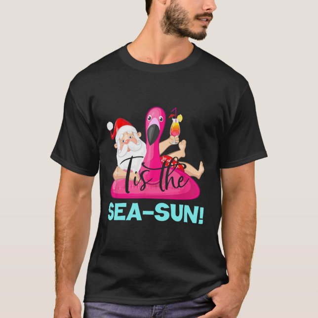 Santa Claus Flamingo Float Tis The Sea-sun Christm T Shirt (Framsida)