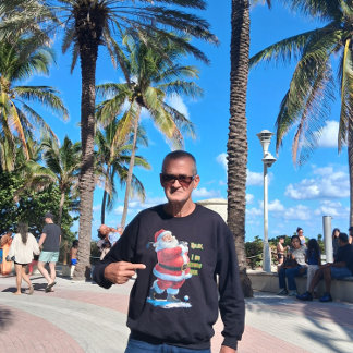 Santa Claus relaxes before the Christmas on a Grey T Shirt