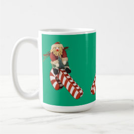 Santa Clause rides candy cane slide for Christmas. Kaffemugg