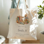 Santa Fe New Mexico Desert Wedding Welcome Tygkasse<br><div class="desc">A warm, hand-painted watercolor tote featuring a curated Santa Fe vignette filled with adobe architecture, turquoise accents, desert botanicals, pottery, and a soft Southwest sunset palette. Designed as a chic welcome gift for your Santa Fe bachelorette weekend, this tote feels equal parts artful and practical. Personalized with the couple’s names...</div>
