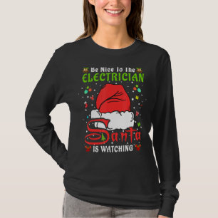 Santa Julafton Pajamas ska vara trevlig mot elektr T Shirt