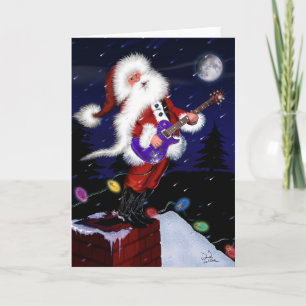 Santa leker gitarren helgkort