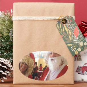 Santa & Mrs Claus God Firande - Festive Ovalt Klistermärke