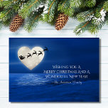 Santa och Heart Full Moon Beach-jul Julkort<br><div class="desc">Det här platta hälsningskortet i julklapp har ett hjärtformade fullt måne med tomten och hans sväv ovanför en av vatten med måne tänd kropp. Hälsning på framsidan lyder ~ "Wishing You a God jul and a Wonderful New Year". Hälsning kan vara personlig att läsa som du vill och det finns...</div>