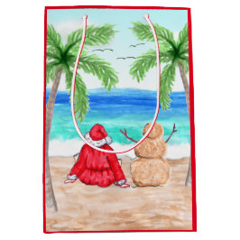 Santa och Sand Snögubbe vid Beach-julen