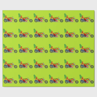 Santa på en motorcykel som slår in papper presentpapper