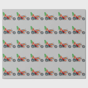 Santa på en motorcykel som slår in papper presentpapper
